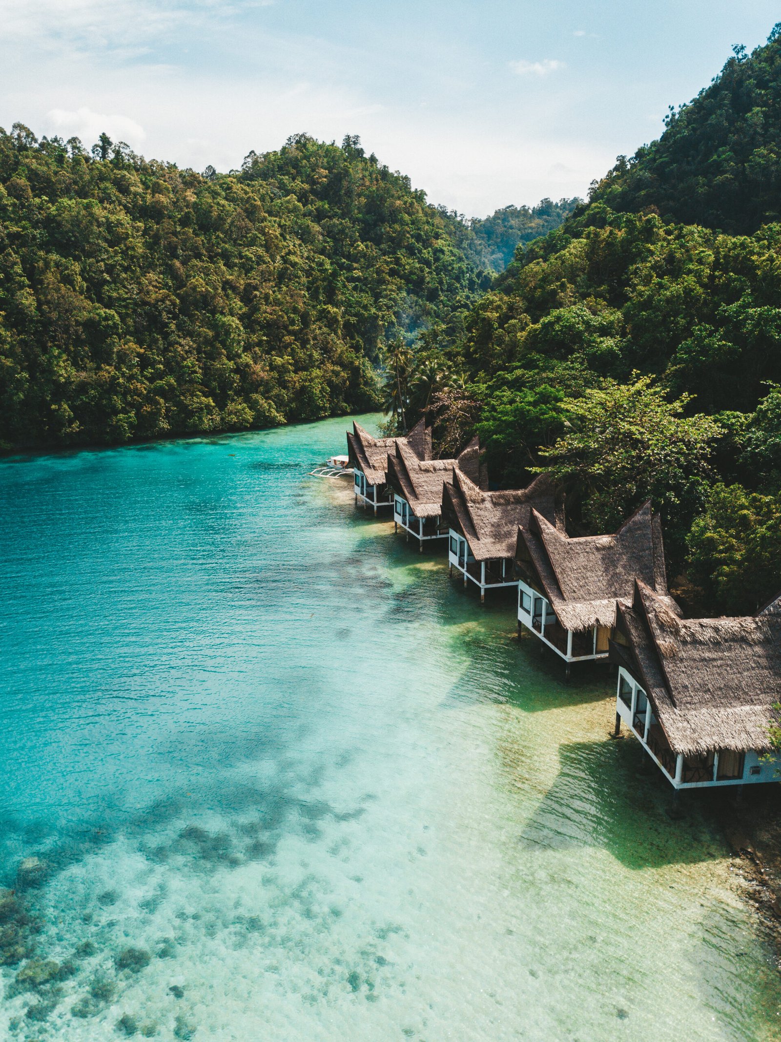 The set of cottages on the ocean under the blue sky
